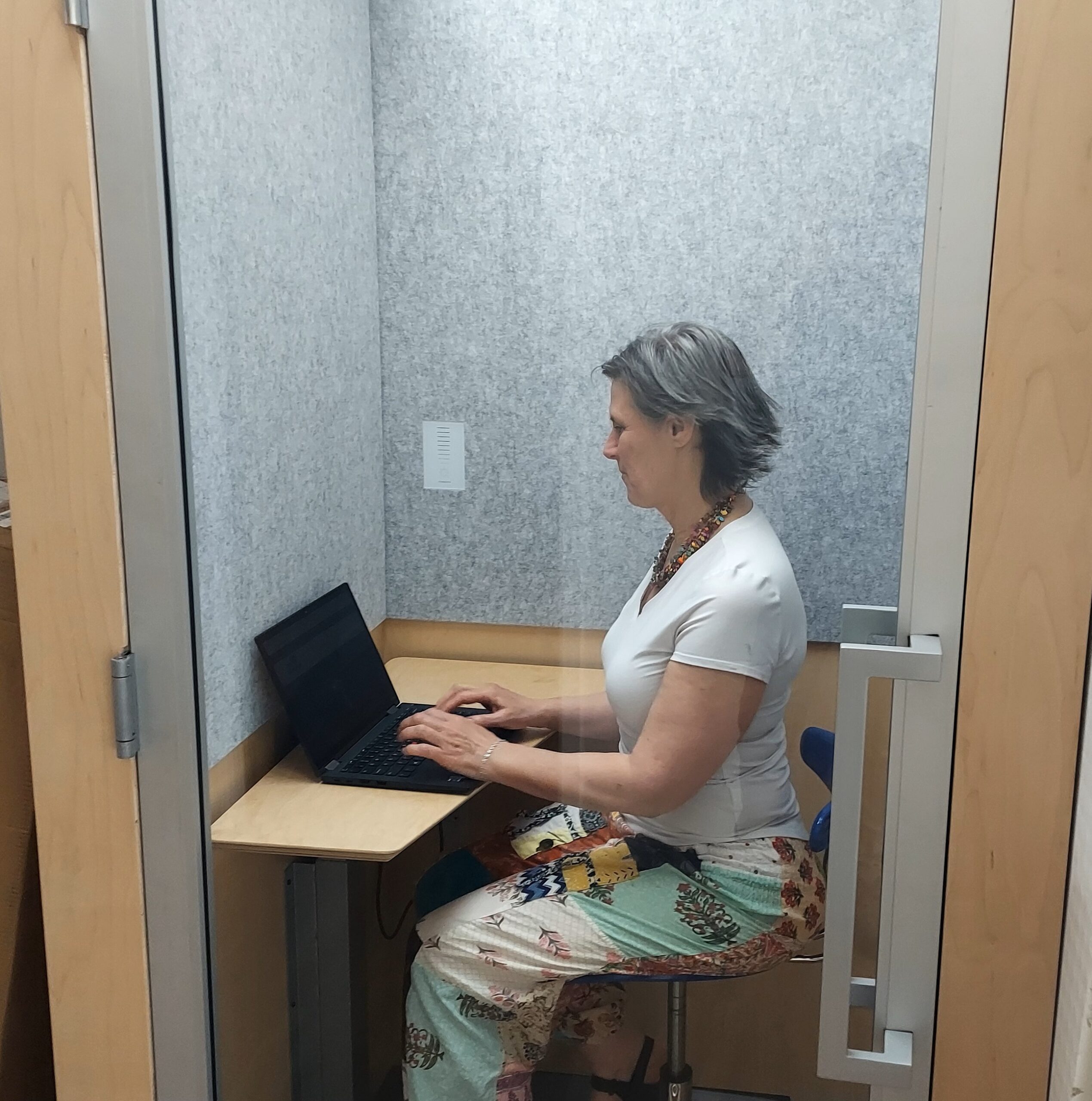 Person working in zen booth